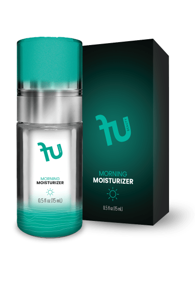 A photo shows a "fu BEAUTY Night Moisturizer" bottle and box on a black background. The clear bottle has a silver pump, teal cap, and teal label with the "fu BEAUTY" logo, "NIGHT MOISTURIZER," a moon and stars icon, and "0.5 fl oz (15 mL)." The bottle contains teal liquid with wavy lines at the bottom of the label. The dark teal box also displays the "fu BEAUTY" logo, "NIGHT MOISTURIZER," a moon and stars icon, and "0.5 fl oz (15 mL)."